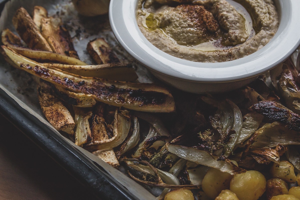 hummus and roasted vegetables on a sheet pan | sultryvegan.com