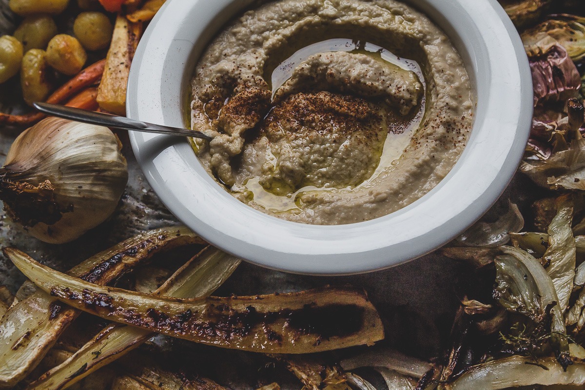 hummus and roasted vegetables on a sheet pan | sultryvegan.com