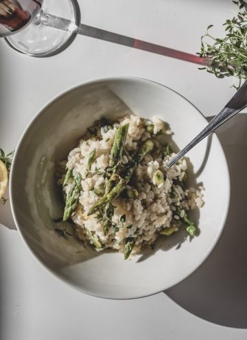 vegan asparagus risotto on a white plate
